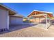 A covered patio with an outdoor kitchen and view of the lawn, backyard and the property at 1357 S Loma Vis, Mesa, AZ 85204