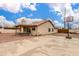 Back exterior view with an outdoor basketball court area at 1414 W Grovers Ave, Phoenix, AZ 85023