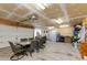 A furnished dining room set inside an attached two car garage at 1414 W Grovers Ave, Phoenix, AZ 85023