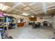 Spacious garage with ample storage and a dining table at 1414 W Grovers Ave, Phoenix, AZ 85023