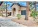 Charming single-story home featuring a stucco exterior, tiled roof, and an inviting arched entryway at 14300 W Bell Rd # 245, Surprise, AZ 85374