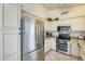 Well-appointed kitchen featuring stainless steel appliances, granite countertops, and ample cabinetry at 14300 W Bell Rd # 245, Surprise, AZ 85374