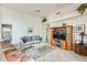 Bright living room with tile floors, vaulted ceilings, and a cozy seating arrangement at 14300 W Bell Rd # 245, Surprise, AZ 85374