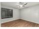 Bright bedroom features wood-look floors and ceiling fan at 1432 W Emerald Ave # 648, Mesa, AZ 85202