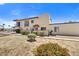 Exterior elevation of the property highlighting the architecture, balcony, and mature landscaping at 14414 N Boxwood Ln, Fountain Hills, AZ 85268