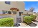 Inviting front entrance featuring a charming tiled awning, beautiful landscaping, and address numbers at 14414 N Boxwood Ln, Fountain Hills, AZ 85268