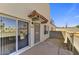 Welcoming front entrance, with tiled awning and security door and low maintenance landscaping at 14414 N Boxwood Ln, Fountain Hills, AZ 85268