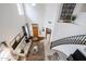 Bright two-story foyer with staircase, stylish decor, and ample natural light from large windows at 14733 N 159Th Dr, Surprise, AZ 85379