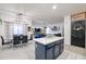 Close up of kitchen featuring blue cabinets and stainless steel appliances at 14733 N 159Th Dr, Surprise, AZ 85379