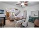 Bright and airy home office with a stylish desk, ample lighting, and a view of the staircase at 14733 N 159Th Dr, Surprise, AZ 85379