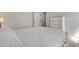 Bedroom showcasing a full bed and white dresser with traditional wood trim at 1556 E Vesper Trl, Queen Creek, AZ 85140