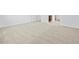 A spacious bedroom with neutral carpet provides a blank canvas for personal design at 16073 W Remuda Dr, Surprise, AZ 85387