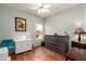 Bright bedroom with hardwood floors and a window view at 16331 W Tierra Way, Surprise, AZ 85374
