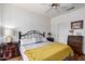 Inviting bedroom features a cozy bed, side tables with lamps, and closet access at 16331 W Tierra Way, Surprise, AZ 85374