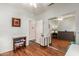 Bright bedroom with hardwood floors, closet and small office space at 16331 W Tierra Way, Surprise, AZ 85374
