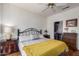 Inviting bedroom features a cozy bed, side tables with lamps, and closet access at 16331 W Tierra Way, Surprise, AZ 85374