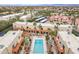 Aerial view of complex with pool and meticulous landscaping, perfect for Arizona living at 16336 E Palisades Blvd # 7, Fountain Hills, AZ 85268