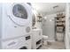 Cozy bathroom featuring a stacked washer/dryer and modern fixtures at 16336 E Palisades Blvd # 7, Fountain Hills, AZ 85268