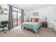 Comfortable bedroom with a balcony offering scenic views and neutral decor at 16336 E Palisades Blvd # 7, Fountain Hills, AZ 85268