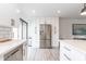 Modern kitchen featuring white cabinets, stainless steel appliances, and sleek countertops at 16336 E Palisades Blvd # 7, Fountain Hills, AZ 85268