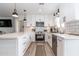 Bright, renovated kitchen boasts modern appliances, ample counter space, and breakfast bar at 16336 E Palisades Blvd # 7, Fountain Hills, AZ 85268
