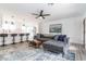 Spacious living room with open-concept design and a breakfast bar with contemporary fixtures at 16336 E Palisades Blvd # 7, Fountain Hills, AZ 85268