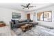 Comfortable living room boasts natural light, plush seating, and a stylish rug at 16336 E Palisades Blvd # 7, Fountain Hills, AZ 85268