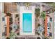 Bird's eye view of a refreshing community pool with lounge chairs and desert landscaping at 16336 E Palisades Blvd # 7, Fountain Hills, AZ 85268