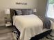 Serene bedroom featuring soft lighting, plush bedding, and a cozy atmosphere at 16513 N 68Th Dr, Peoria, AZ 85382