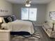 Calming bedroom with a ceiling fan, plush bedding, and decorative accents at 16513 N 68Th Dr, Peoria, AZ 85382