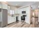 Modern kitchen featuring stainless steel appliances, sleek countertops, and ample cabinet space at 16513 N 68Th Dr, Peoria, AZ 85382