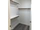 Organized walk-in closet with ample storage space and wood accents at 16513 N 68Th Dr, Peoria, AZ 85382