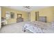 Neutral primary bedroom with carpet, neutral paint, and traditional furniture at 1694 E Mia Ln, Gilbert, AZ 85298