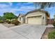Attractive home with a two-car garage, neat landscaping, and welcoming front exterior at 1694 E Mia Ln, Gilbert, AZ 85298