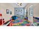 Colorful playroom with alphabet mats, toy storage, and fun decorations at 1694 E Mia Ln, Gilbert, AZ 85298