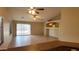 Bright living space with tile floors, backyard access, and easy access to the kitchen at 17151 W Mohave St, Goodyear, AZ 85338