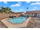 Sparkling pool in a private backyard, perfect for relaxing and entertaining with desert landscaping and block fence at 2218 E Desert Trumpet Rd, Phoenix, AZ 85048