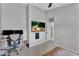 Bedroom featuring a desk, a TV and an office chair at 2218 E Desert Trumpet Rd, Phoenix, AZ 85048