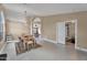 Open-concept dining area with beige walls and doorway leading to a bedroom at 2218 E Desert Trumpet Rd, Phoenix, AZ 85048