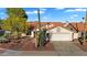 Charming single-Gathering home with a terra cotta roof, mature desert landscaping and a two-car garage at 2218 E Desert Trumpet Rd, Phoenix, AZ 85048