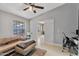 Comfortable living room featuring a couch and desk space at 2218 E Desert Trumpet Rd, Phoenix, AZ 85048