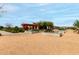 Beautiful community garden with planters and pergola in a park-like setting under a sunny sky at 22434 S 226Th Pl, Queen Creek, AZ 85142