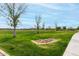 Park featuring lawn, trees, and a walking path at 22434 S 226Th Pl, Queen Creek, AZ 85142