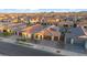 Aerial view of a well-maintained suburban neighborhood with tile roofs and desert landscaping at 22473 E Twilight Dr, Queen Creek, AZ 85142
