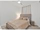 Cozy bedroom with plush carpeting, comfortable bed, and soft lighting at 22473 E Twilight Dr, Queen Creek, AZ 85142
