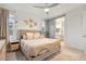 Comfortable bedroom with a queen size bed, soft decor, and ample natural light at 22473 E Twilight Dr, Queen Creek, AZ 85142