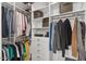 Organized walk-in closet with shelving, drawers, and ample hanging space at 22473 E Twilight Dr, Queen Creek, AZ 85142