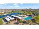 Community pool area with multiple pools and shaded seating, ideal for Gathering fun at 22473 E Twilight Dr, Queen Creek, AZ 85142