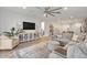 Stylish living room featuring plush seating, contemporary decor, and an open layout for relaxation at 22473 E Twilight Dr, Queen Creek, AZ 85142