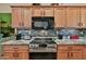 Modern kitchen boasts stainless steel oven, stylish backsplash and ample storage at 24721 W Dove Butte --, Buckeye, AZ 85326